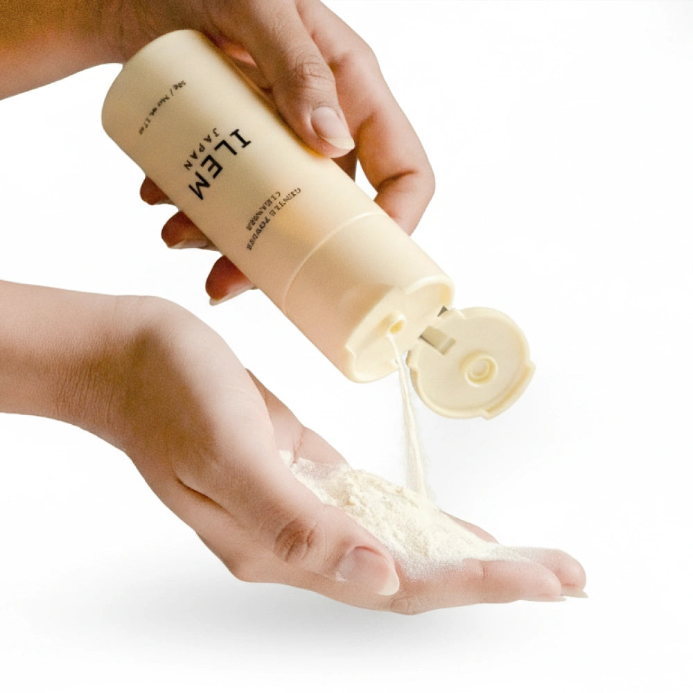 powder face wash in palm foaming with water amino-acid surfactants